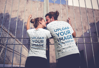T-Shirt Mockup Featuring a Young Couple Kissing