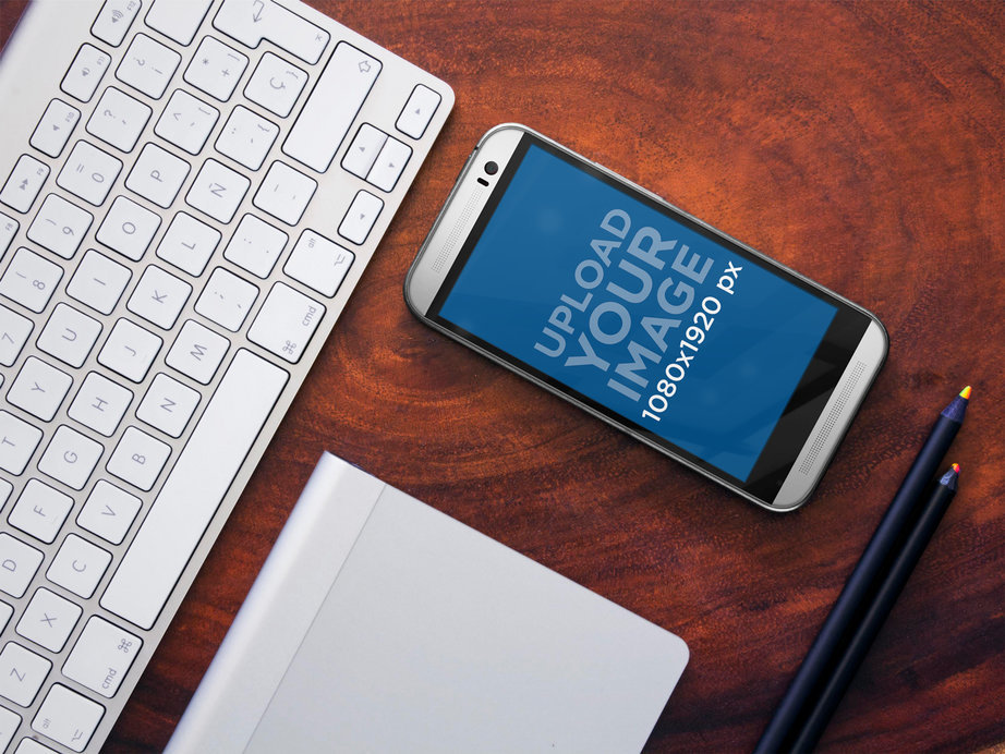 HTC One M8 Mockup Placed on an Office Desktop