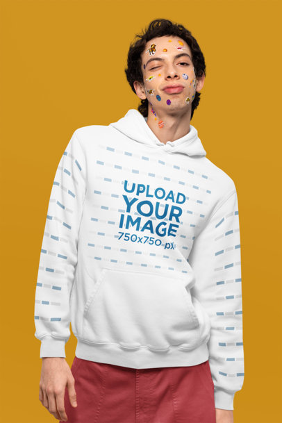 Pullover Hoodie Mockup Featuring a Man With Stickers on His Face