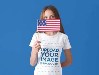 Patriot White Girl Holding a Small American Flag Wearing a T-Shirt Mockup