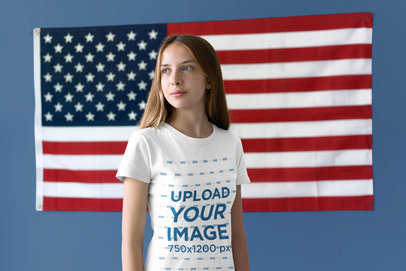 Woman Wearing a T-Shirt Mockup in a Room with an American Flag