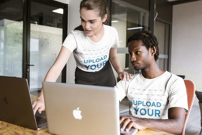 Girl Showing Something a Man on his Monitor Wearing T-Shirts Mockup a20511