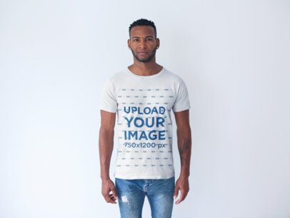 Front Shot of a Tshirt Mockup Featuring a Man in a White Room