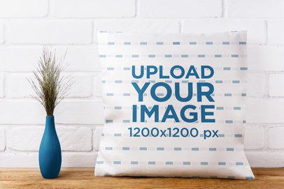 Mockup of a Squared-Shaped Pillow Placed over Wooden Furniture