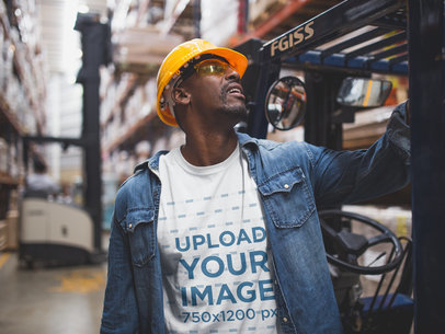 Industrial Worker Checking Out a Forklift Wearing a T-Shirt Mockup