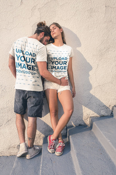 Loving Couple Wearing Round Neck Tees Mockup During the Afternoon