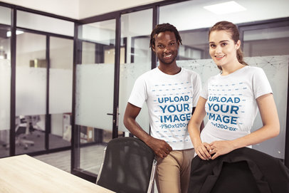 Interracial Group of Smiling Coworkers Wearing T-Shirts Mockup at the Office