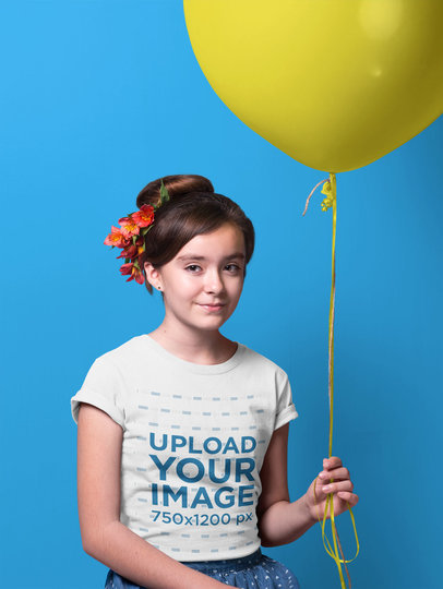Portrait of a Girl Wearing a T-Shirt Mockup Holding a Balloon