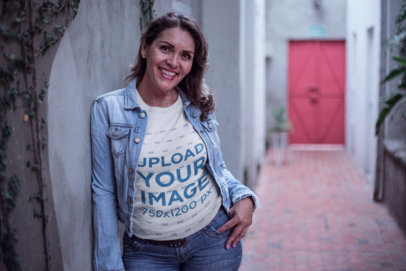 Smiling Senior Lady Wearing a T-Shirt Mockup at a Corridor a20369