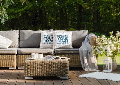 Mockup of Two Squared Pillows Placed on a Patio Sofa