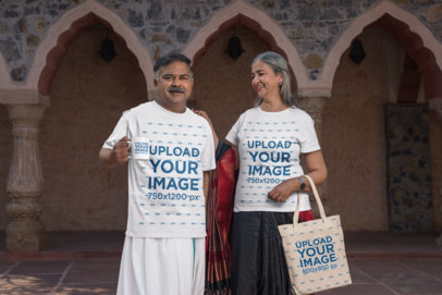 Coffee Mug and Tote Bag Mockup of a Senior Couple Wearing Crewneck Gildan Tees