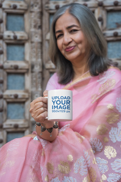Mockup of a Senior Woman in a Traditional Outfit Holding an 11 oz Coffee Mug