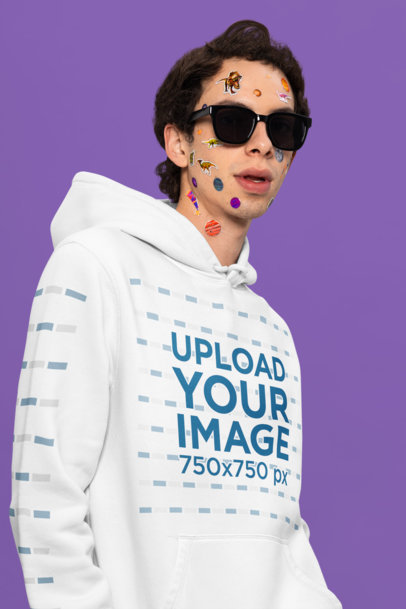 Pullover Hoodie Mockup Featuring a Man with Sunglasses and Face Stickers