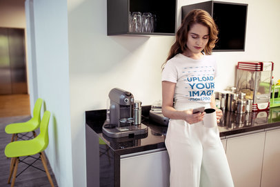 Woman Wearing a Tshirt Mockup at the Office Kitchen