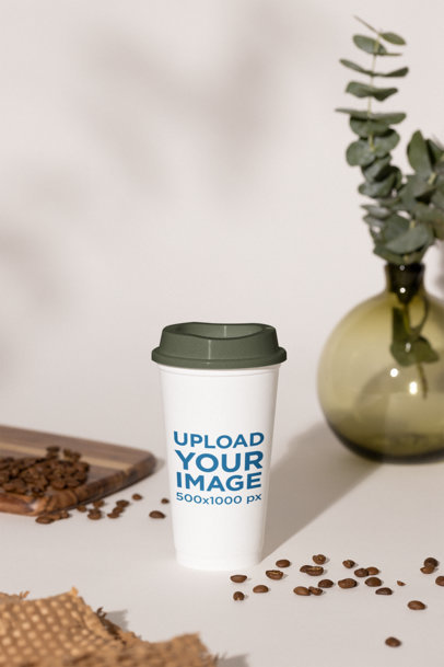 Coffee Cup Mockup Featuring an Aesthetic Setting with Coffee Beans m32223