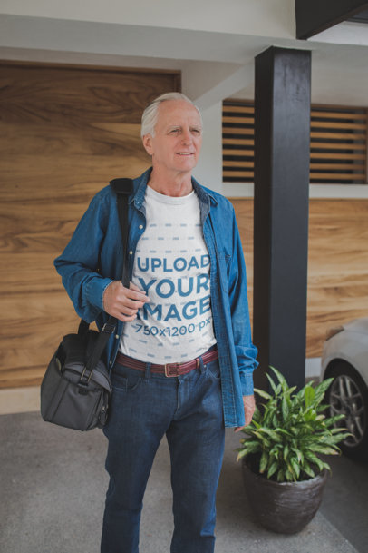 Senior Man Wearing a Tshirt Mockup Getting out of his House