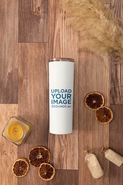 Mockup of a Skinny Tumbler Placed on a Wooden Surface