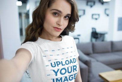 Selfie of a Woman Wearing a Tshirt Mockup at the Office