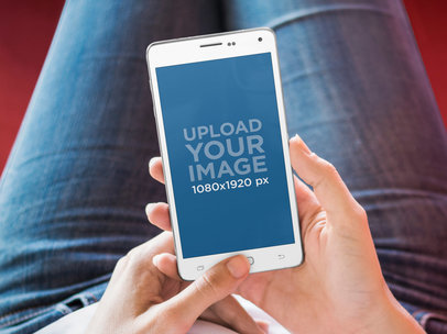 Mockup of a Woman Using a Samsung Galaxy S5 Phone