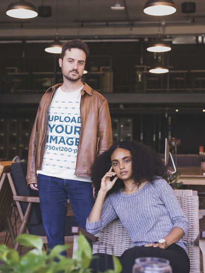 Man Wearing a Tshirt Mockup While Standing with his Girlfriend