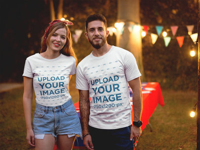 Man and Woman Wearing T-Shirts Mockup at a 4th of July BBQ Party