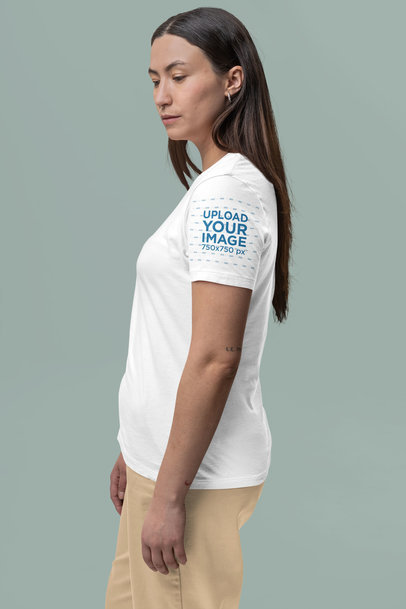 T-Shirt Sleeve Mockup Featuring a Serious Woman Posing at a Studio