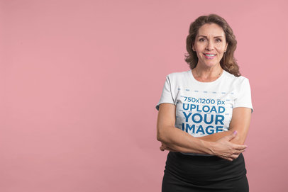 Smiling Woman Wearing a Tshirt Mockup in a Solid Color Room a20372