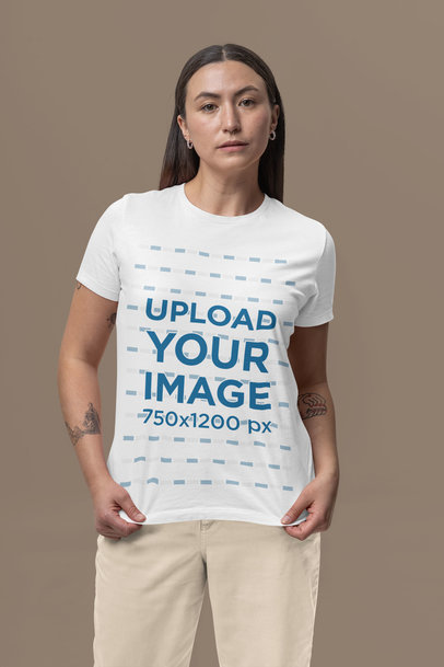 Mockup of a Woman with a Tattooed Woman Wearing a Bella Canvas T-Shirt