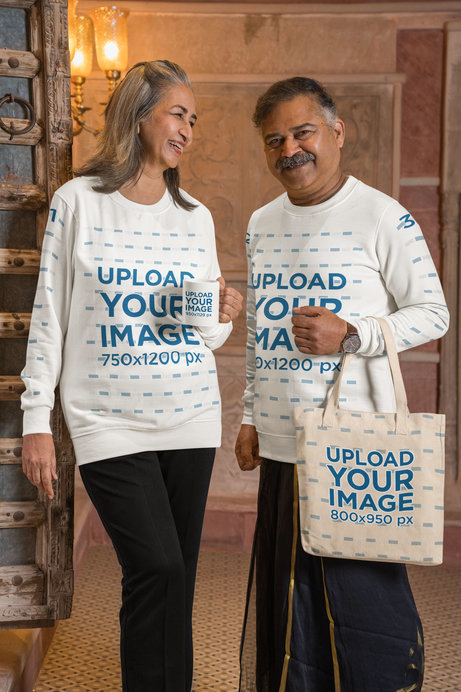 Sweatshirt Mockup of a Happy Elder Couple With a Coffee Mug and a Tote Bag