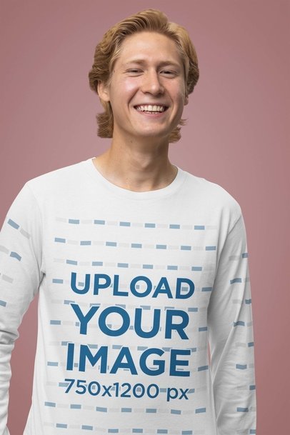 Bella Canvas Long Sleeve Tee Mockup Featuring a Smiling Man in a Studio
