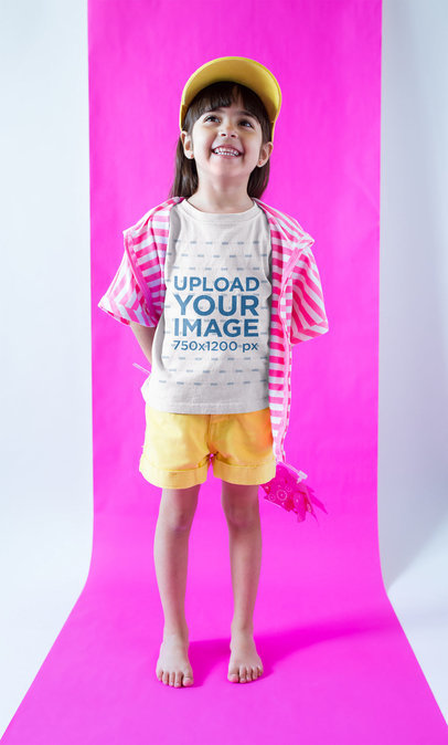 Smiling Girl Wearing a Tshirt Mockup in a  Fuchsia and White Room