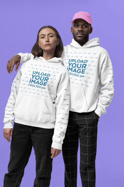 Gildan Hoodie Mockup of a Serious Man and Woman in a Studio