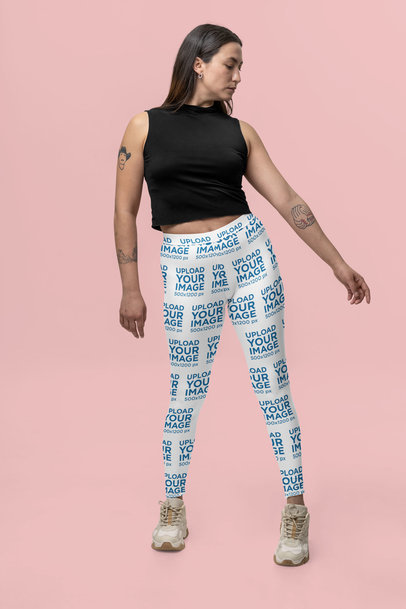 Leggings Mockup of a Tattooed Woman Posing in a Studio