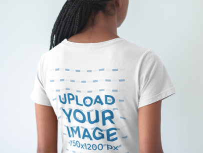 Closeup of the Back of a Tshirt Mockup Being Worn by a Black Woman with Braids