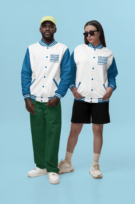 Bomber Jacket Mockup Featuring a Man and Woman Posing in a Customizable Background