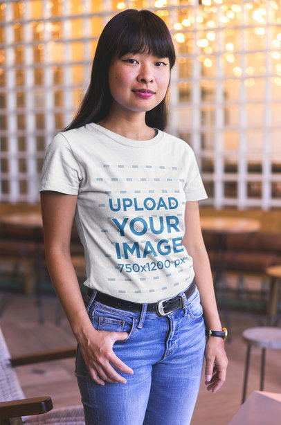 Asian Woman Wearing a T-Shirt Mockup at a Startup