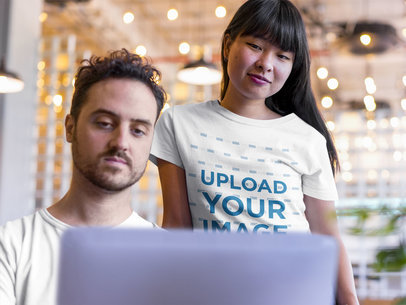 Woman Wearing a TShirt Mockup while with her Coworker