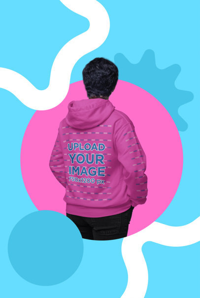 Back-View Hoodie Mockup Featuring a Man Posing in a Trans-Themed Studio