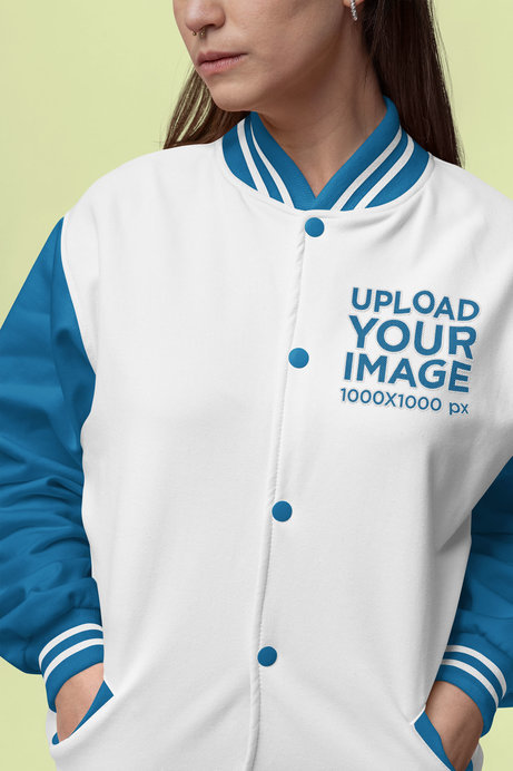 Mockup of a Cropped-Face Woman Wearing a Bomber Jacket