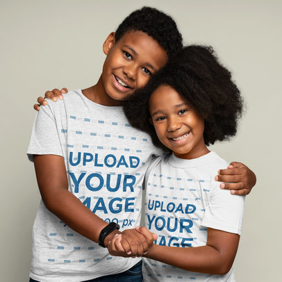 Siblings Day-Themed T-Shirt Mockup of a Smiling Boy Hugging Her Sister 