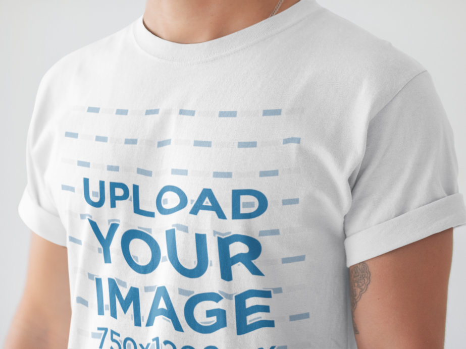 Angled Closeup of a T-Shirt Mockup Being Worn by a White Man