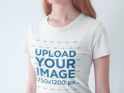 Angled Closeup of a T-Shirt Mockup Being Worn by a White Woman