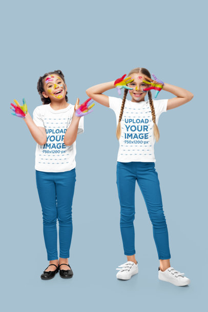 T-Shirt Mockup of Two Happy Sisters with Painted Faces Posing for Siblings Day 