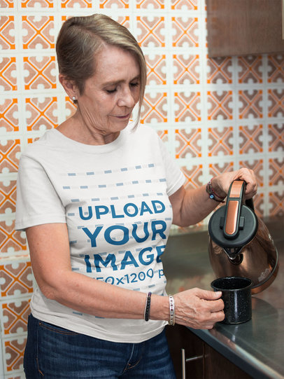 Woman Wearing a Tshirt Mockup Serving a Cup of Coffee