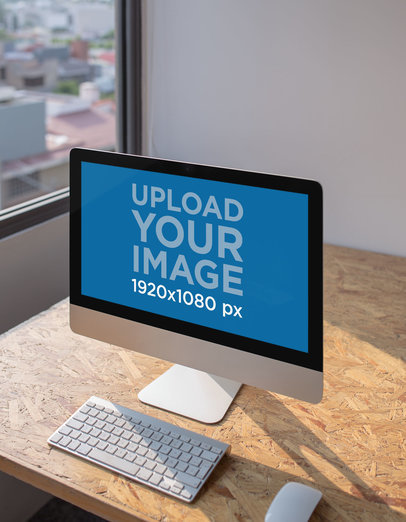 iMac Mockup Standing on a Recycled Compressed Wooden Desk a20983