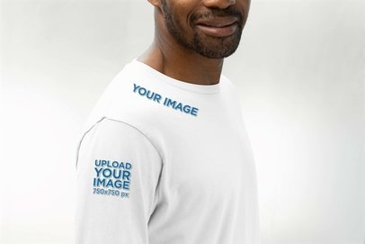 Bella Canvas Long Sleeve Tee Mockup of a Man Posing in a Studio