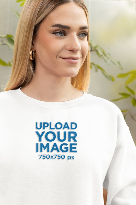Closeup Mockup of a Smiling Woman Wearing a Gildan Crewneck Sweatshirt