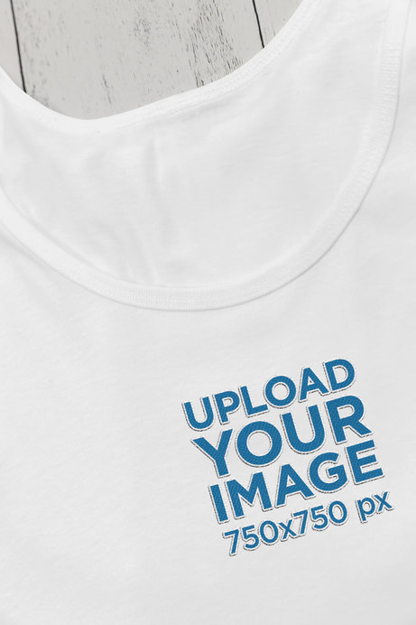 Closeup Mockup of a Round-Neck Bella Canvas Tank Top with Embroidered Elements