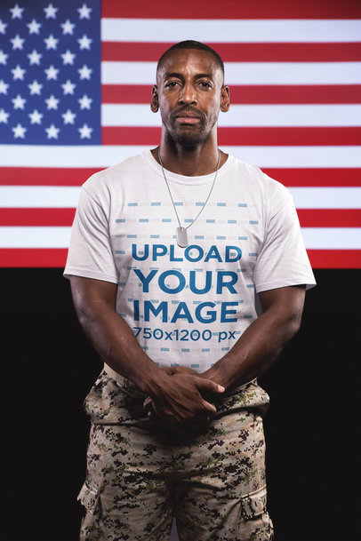 Veteran Wearing a T-Shirt Mockup Standing Against the American Flag