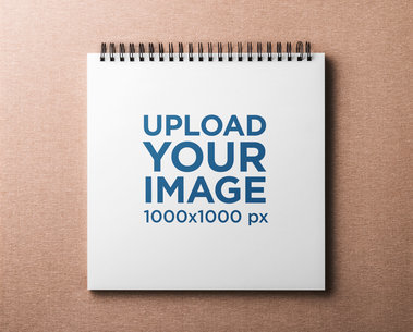 Mockup of a Notebook Placed on a Flat Surface